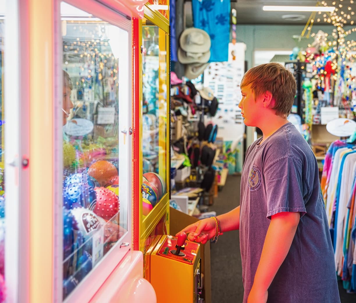 The claw machine inside the Ocean Isle Beach Pier arcade