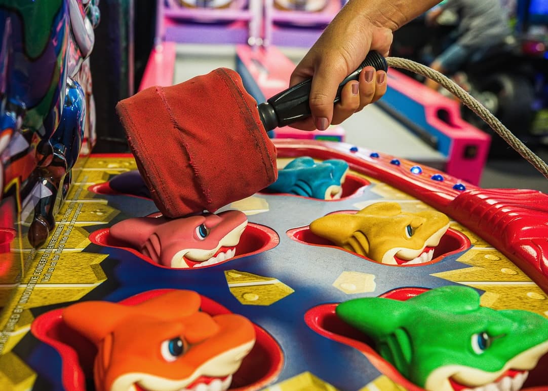 A shark arcade game with bright arcade colors