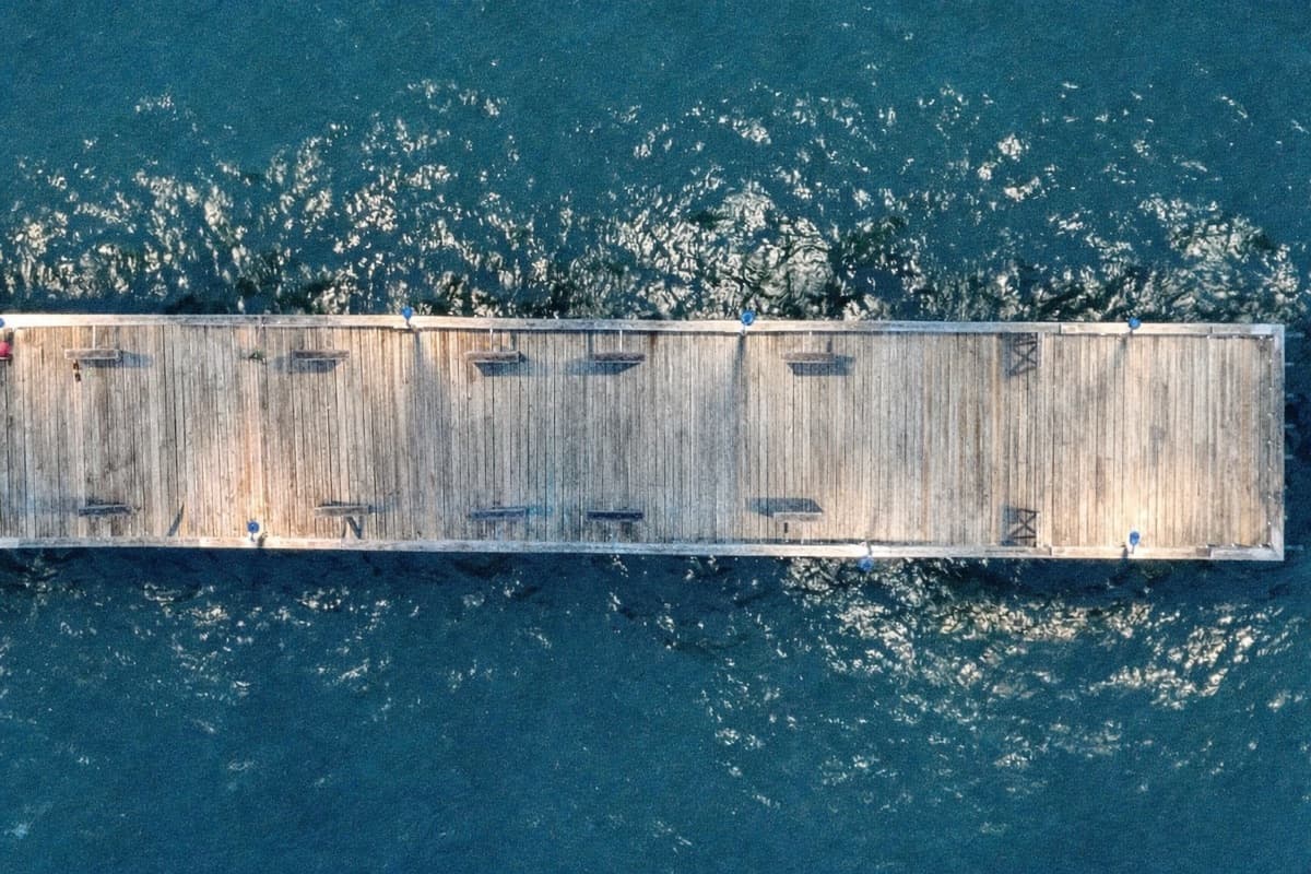 Top-down aerial view of the pier deck on the water