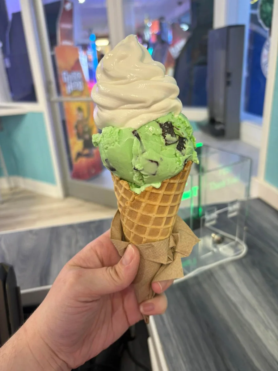 A pistachio soft serve cone