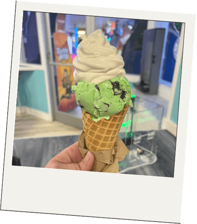 A pistachio soft serve cone